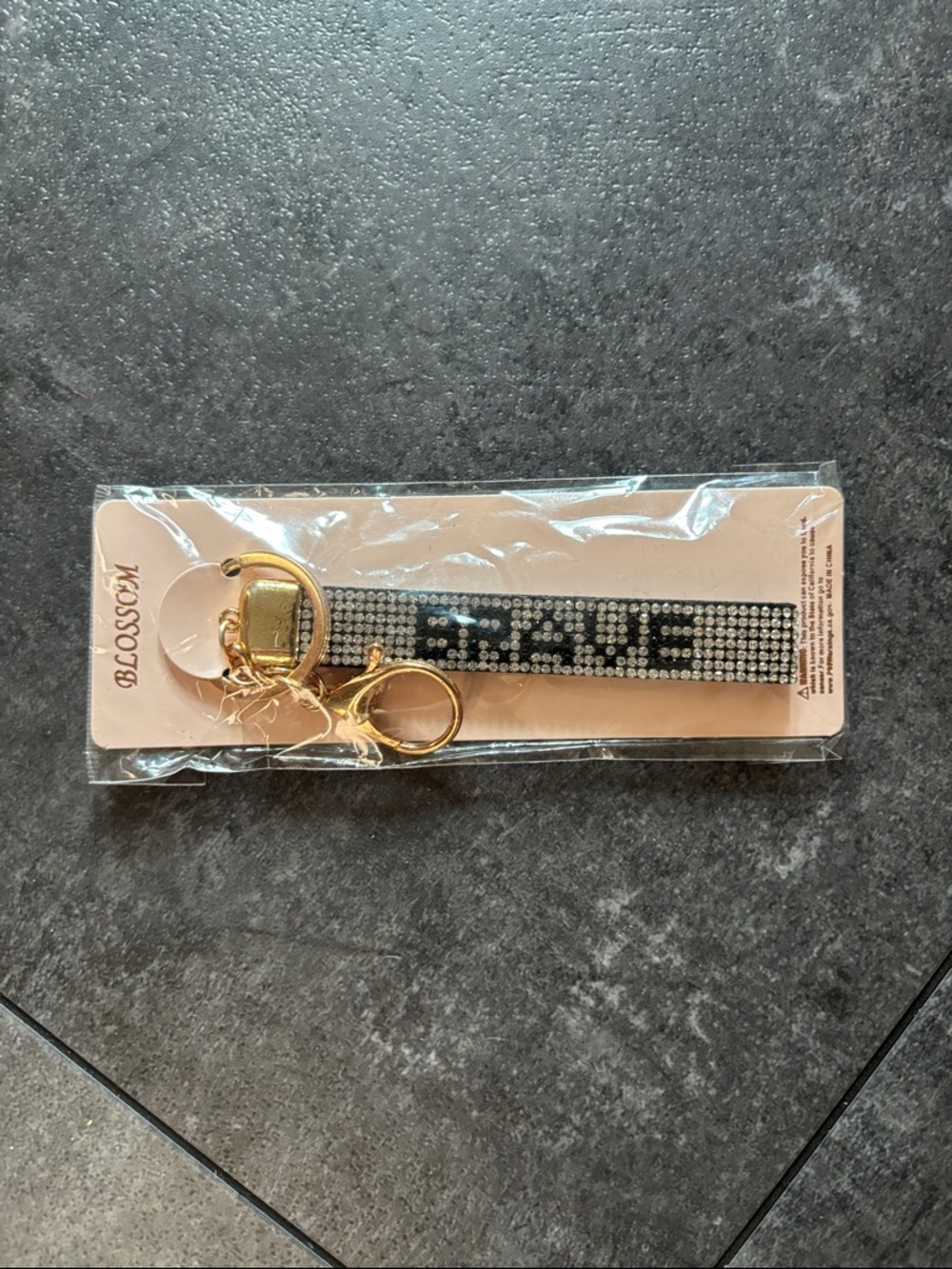 Black Crystal Strap Keychain with Gold Hardware